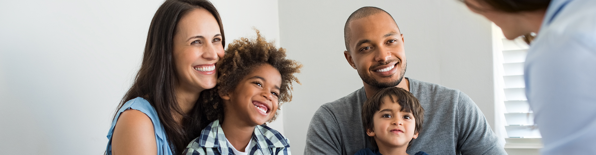 Family looks happy during informal meeting with professional