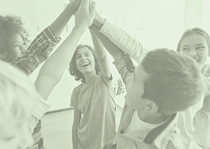 5 students smiling doing a single high five