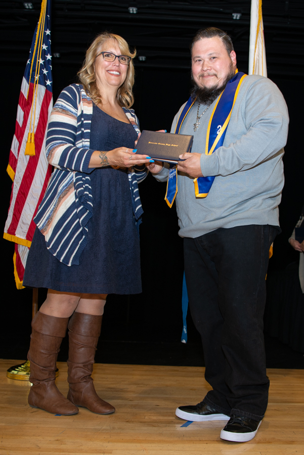 Pat Baca III Accepting Diploma for Pat Baca