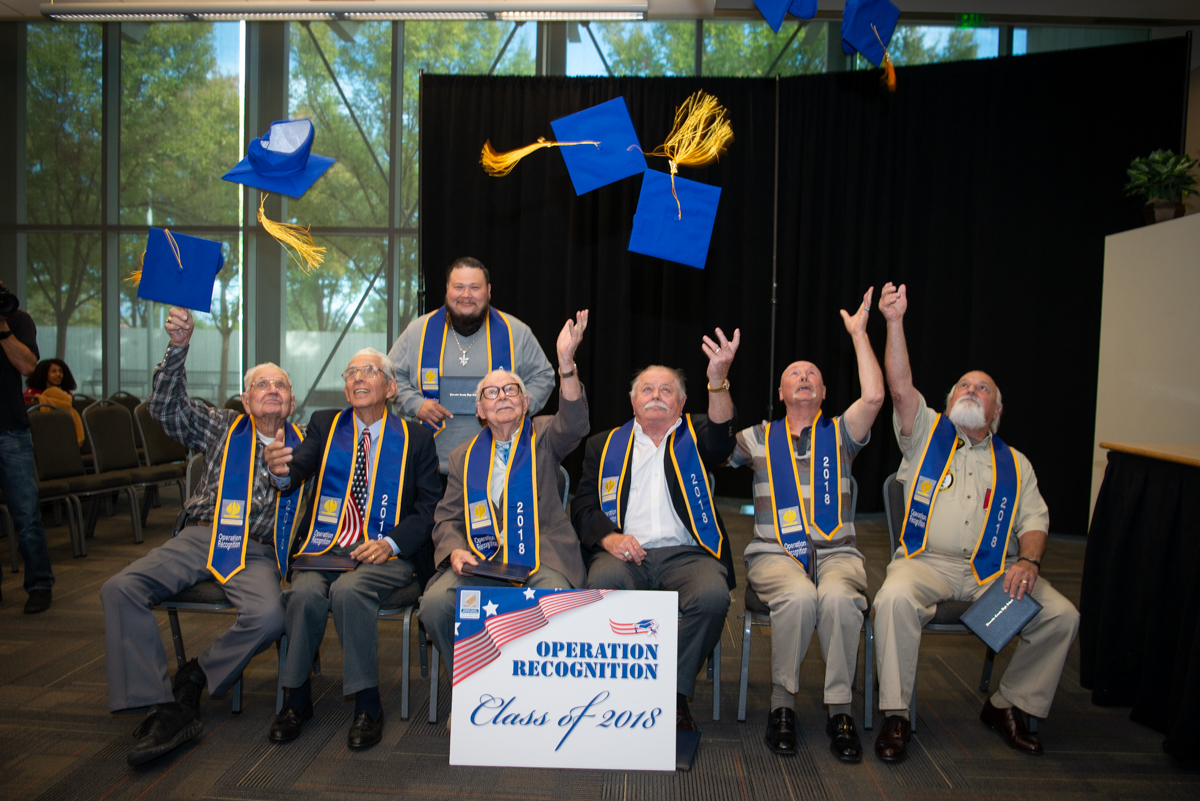 Operation Recognition Class of 2018 Throwing Caps in Air