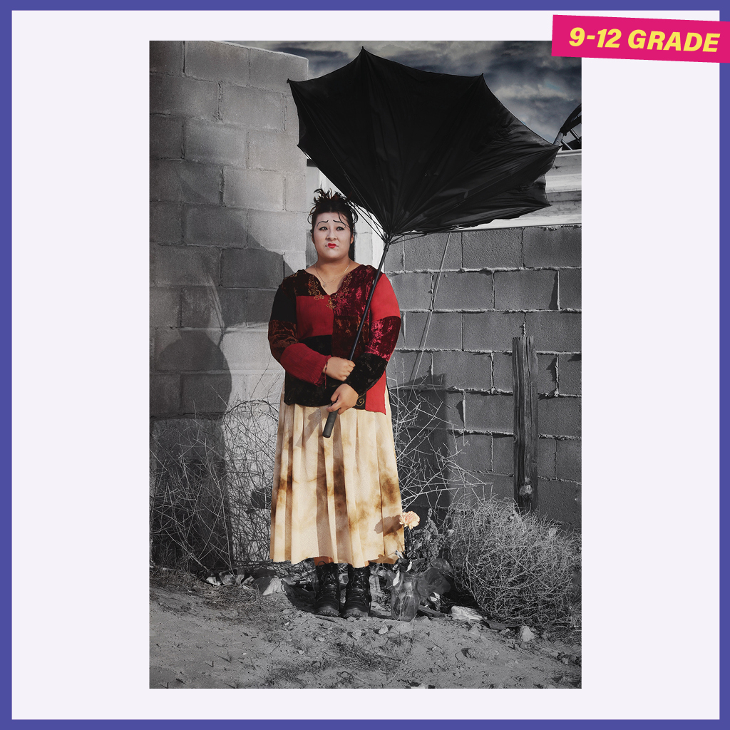 Sad woman outside in a grey background with an umbrella