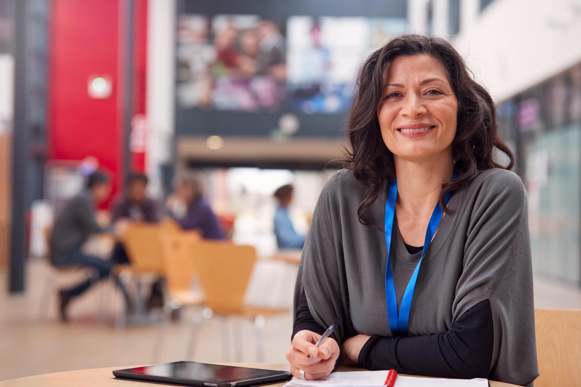 Women at desk in library